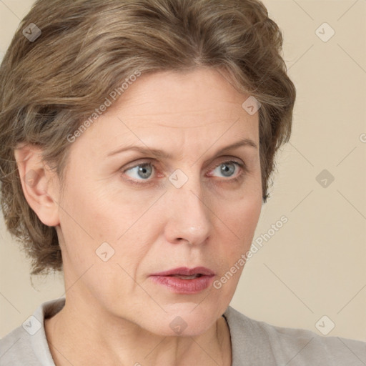 Neutral white adult female with short  brown hair and blue eyes