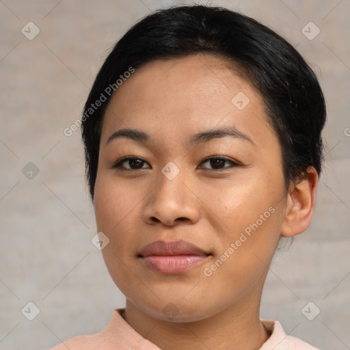 Joyful asian young-adult female with short  brown hair and brown eyes