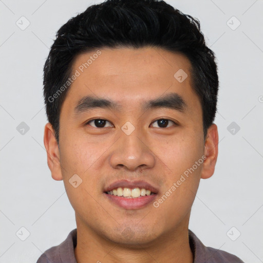 Joyful latino young-adult male with short  black hair and brown eyes