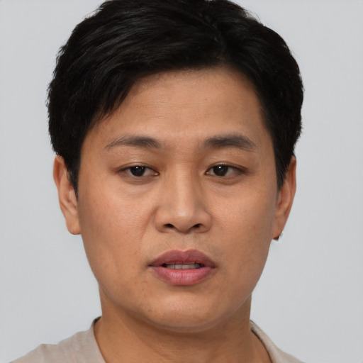 Neutral asian young-adult female with short  black hair and brown eyes