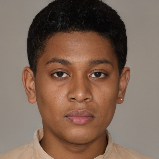 Neutral latino young-adult male with short  brown hair and brown eyes
