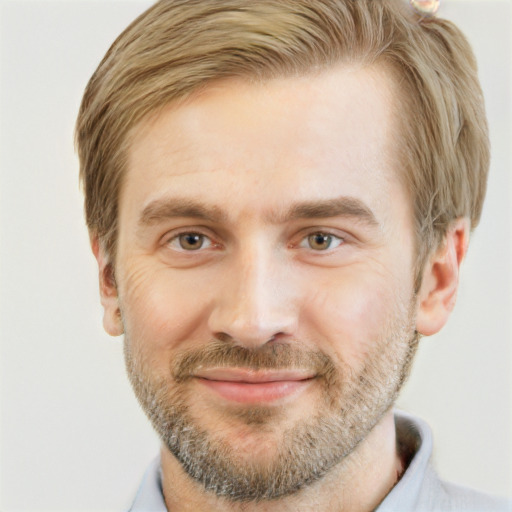 Joyful white adult male with short  brown hair and grey eyes