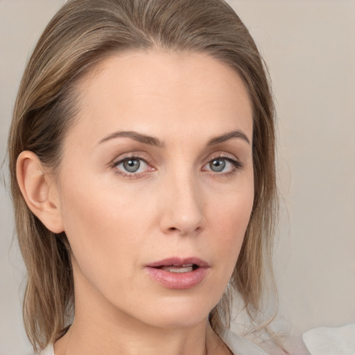 Neutral white young-adult female with medium  brown hair and brown eyes