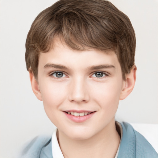 Joyful white child male with short  brown hair and grey eyes