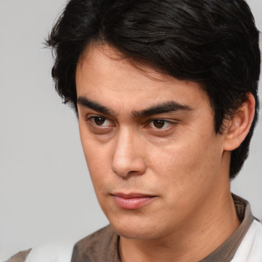 Neutral latino young-adult male with short  brown hair and brown eyes