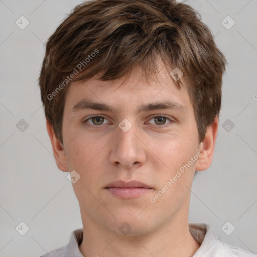 Neutral white young-adult male with short  brown hair and grey eyes