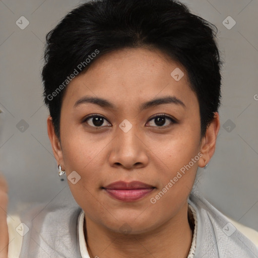 Joyful asian young-adult female with short  black hair and brown eyes