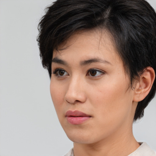 Neutral white young-adult female with short  brown hair and brown eyes