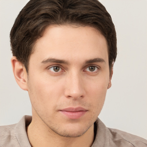 Neutral white young-adult male with short  brown hair and brown eyes