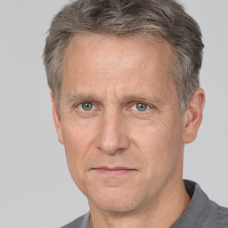 Neutral white middle-aged male with short  brown hair and brown eyes