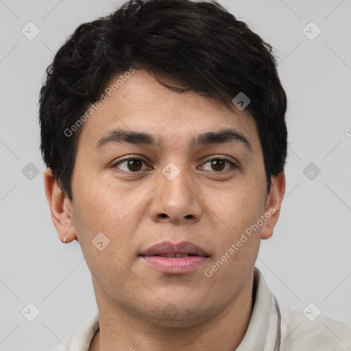 Joyful latino young-adult male with short  brown hair and brown eyes