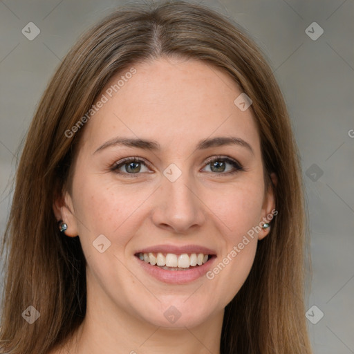 Joyful white young-adult female with long  brown hair and green eyes