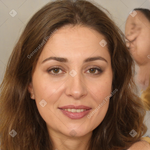 Joyful white adult female with long  brown hair and brown eyes