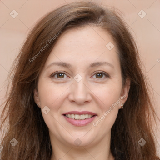 Joyful white adult female with long  brown hair and brown eyes