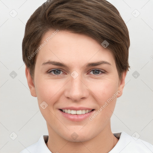 Joyful white young-adult female with short  brown hair and grey eyes