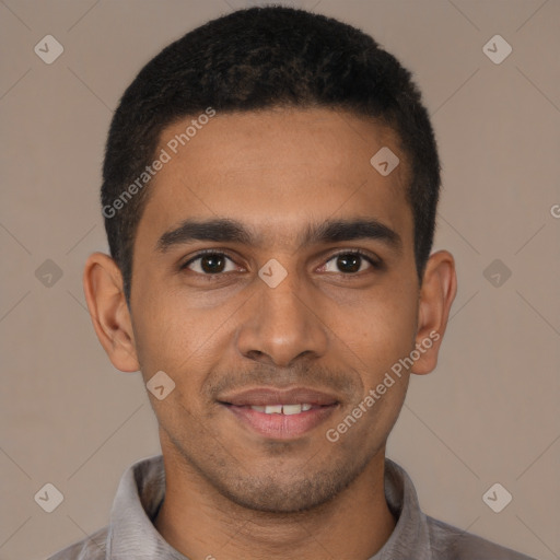 Joyful latino young-adult male with short  brown hair and brown eyes