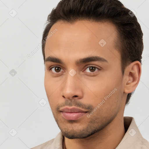 Neutral white young-adult male with short  brown hair and brown eyes