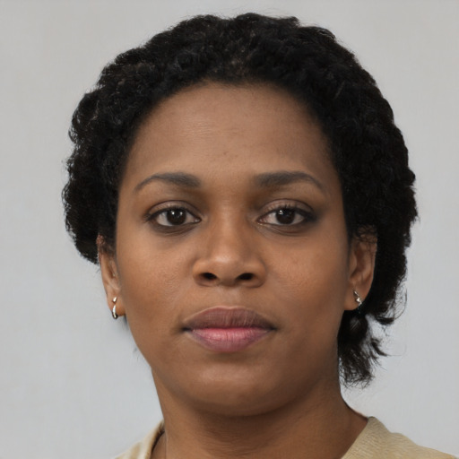 Neutral black young-adult female with short  black hair and brown eyes