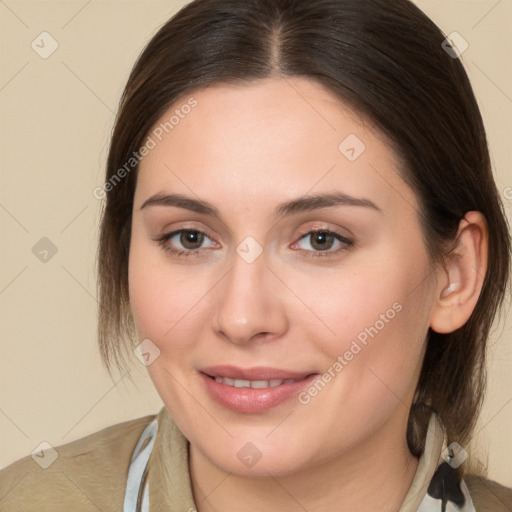 Joyful white young-adult female with medium  brown hair and brown eyes