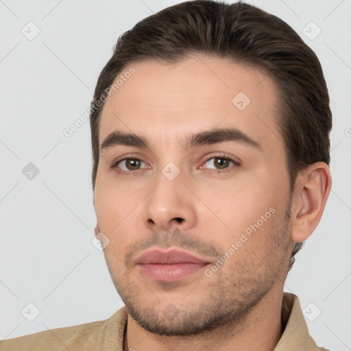 Joyful white young-adult male with short  brown hair and brown eyes