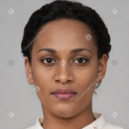 Joyful black young-adult female with short  black hair and brown eyes