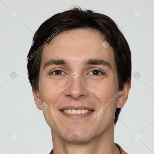 Joyful white adult male with short  brown hair and grey eyes