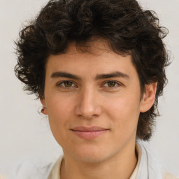 Joyful white young-adult male with medium  brown hair and brown eyes