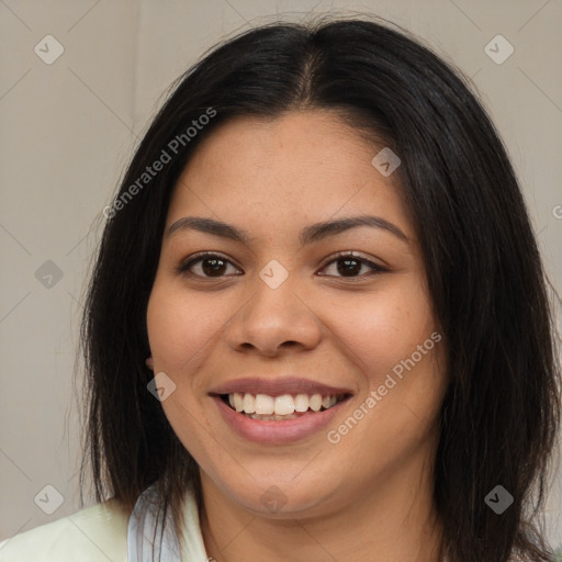 Joyful asian young-adult female with long  brown hair and brown eyes