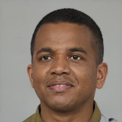 Neutral black young-adult male with short  brown hair and brown eyes