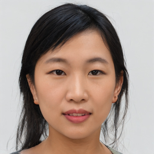 Neutral asian young-adult female with medium  black hair and brown eyes