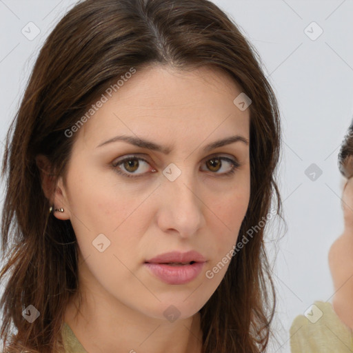 Neutral white young-adult female with long  brown hair and brown eyes