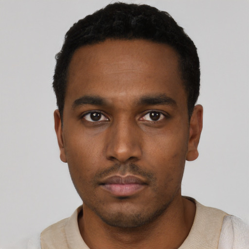 Neutral black young-adult male with short  black hair and brown eyes