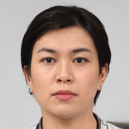 Neutral white young-adult female with medium  brown hair and brown eyes