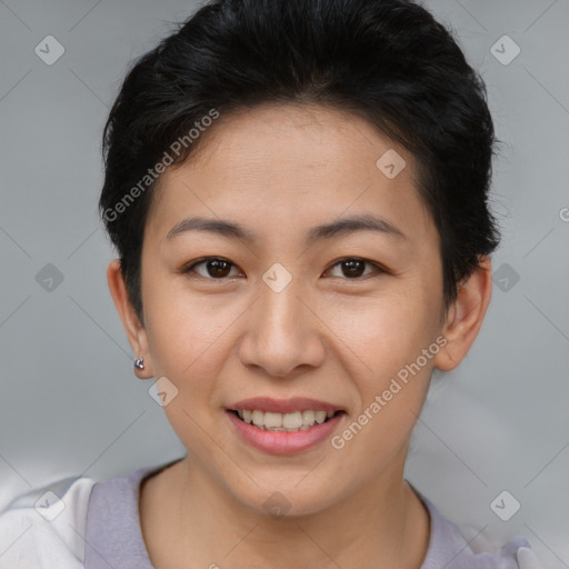 Joyful asian young-adult female with short  brown hair and brown eyes