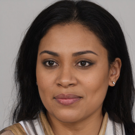 Joyful asian young-adult female with long  brown hair and brown eyes