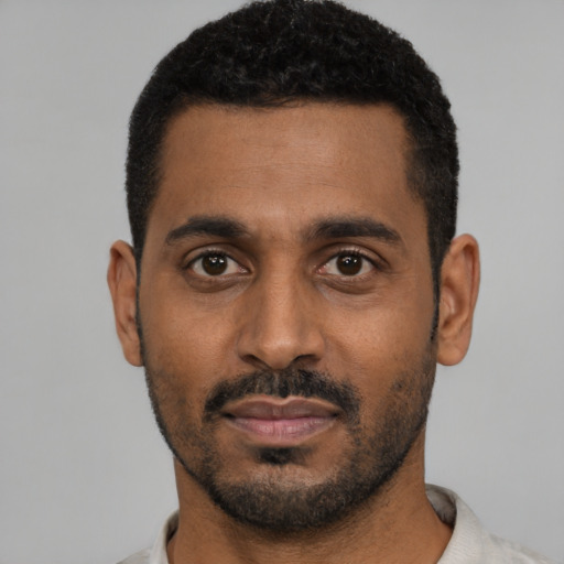 Neutral black young-adult male with short  black hair and brown eyes