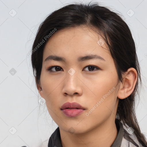 Neutral asian young-adult female with medium  brown hair and brown eyes