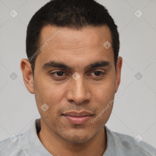 Joyful white young-adult male with short  black hair and brown eyes