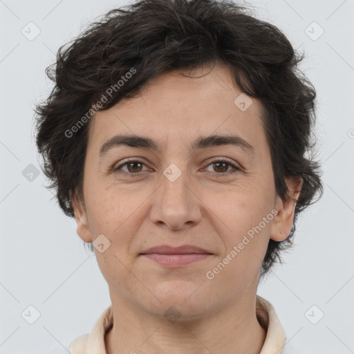 Joyful white adult female with short  brown hair and brown eyes