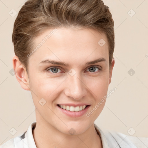 Joyful white young-adult female with short  brown hair and grey eyes