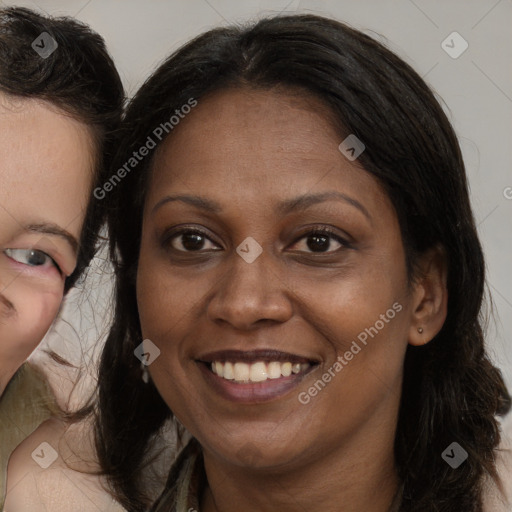 Joyful white adult female with long  brown hair and brown eyes