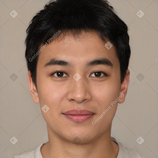 Joyful asian young-adult male with short  brown hair and brown eyes