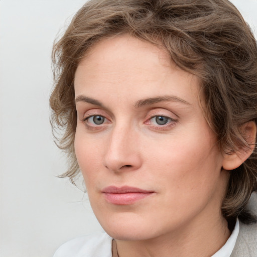 Neutral white young-adult female with medium  brown hair and blue eyes