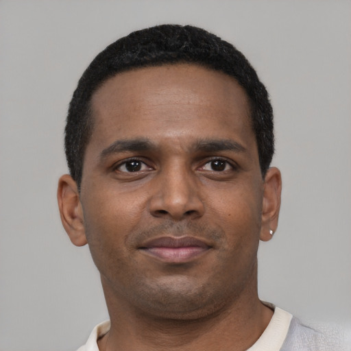Neutral black young-adult male with short  brown hair and brown eyes