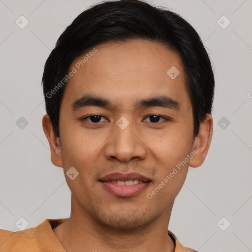 Joyful asian young-adult male with short  black hair and brown eyes