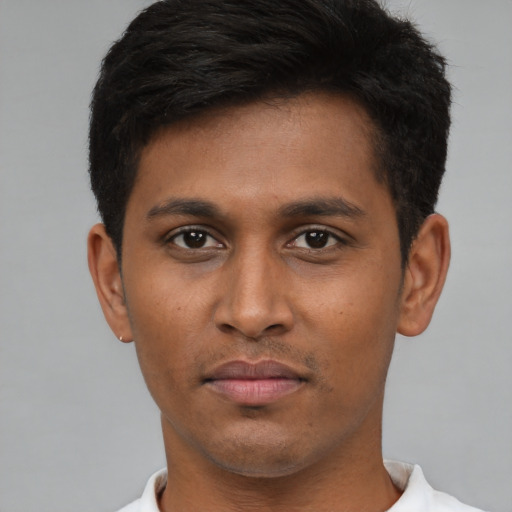 Neutral black young-adult male with short  brown hair and brown eyes
