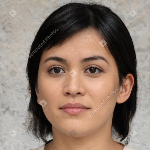 Joyful asian young-adult female with medium  black hair and brown eyes