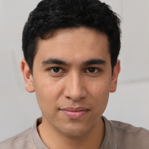 Neutral latino young-adult male with short  brown hair and brown eyes