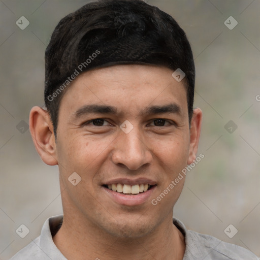 Joyful white young-adult male with short  black hair and brown eyes