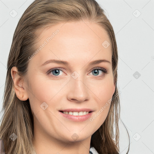 Joyful white young-adult female with long  brown hair and blue eyes